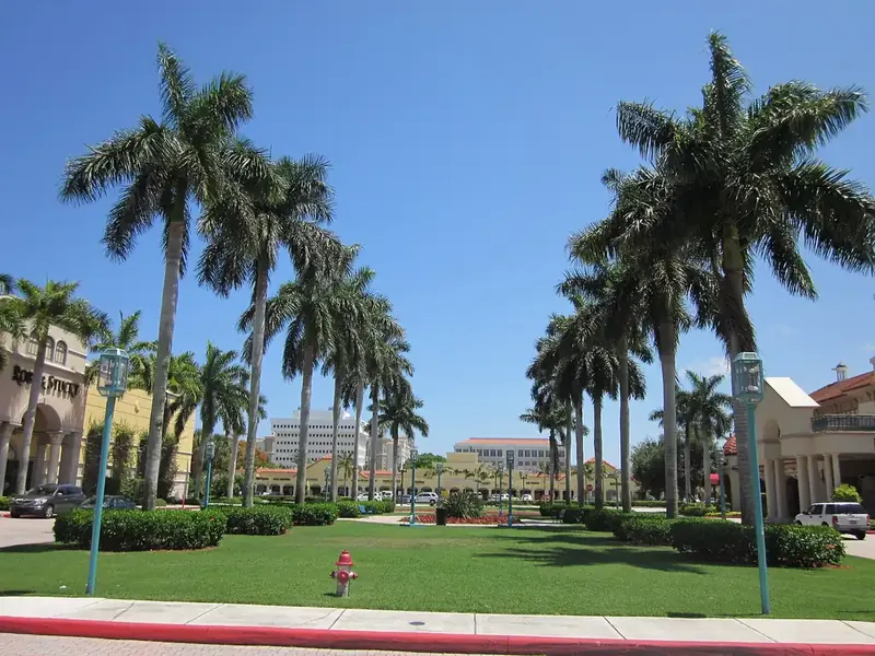 Insurance Boca Raton homeowners and drivers know: the palm-lined plaza at Mizner Park, downtown